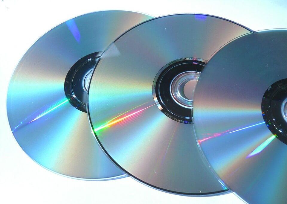 Three overlapping CD drives.